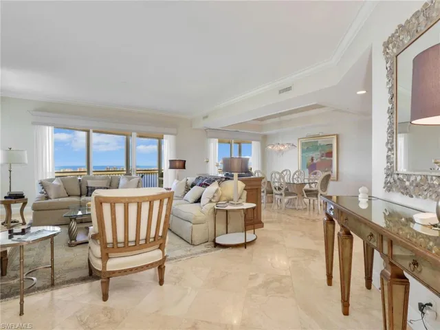 Grand entry with beautiful tile and crown molding