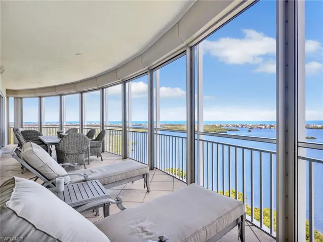 Spectacular 20th-floor balcony offering unobstructed Gulf views, ample seating for outdoor living, and a front-row seat to stunning sunsets and coastal scenery.