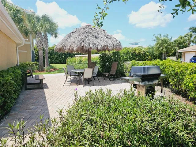 Barbeque area with tiki hut right by your unit