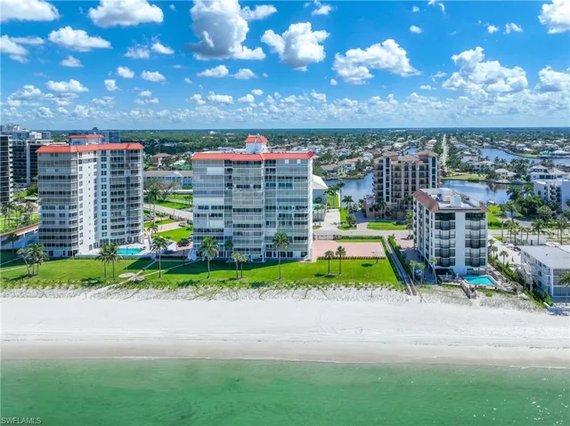 Bird's eye view of waterfront with a beach