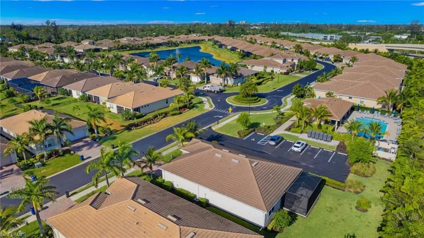 Bird's eye view with a residential view and a water view
