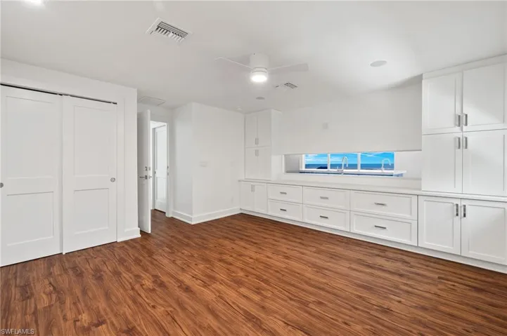 Guest Bedroom/Office space with one-way mirror looking out with view of Gulf of Mexico