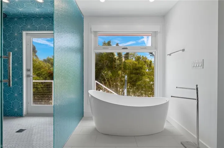 Primary Bathroom - walk-in shower with designer tiles