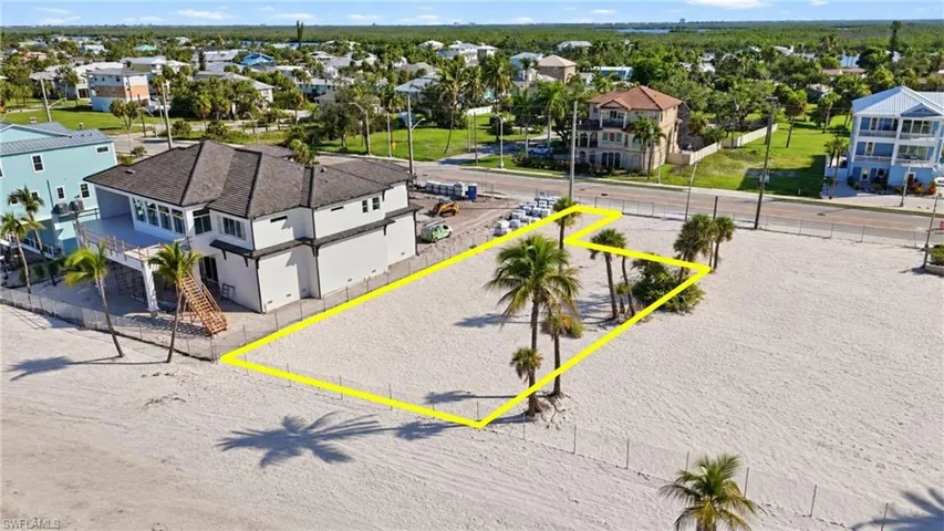 Expansive sandy lot with established  - Virtually Edited Imagepalm trees and direct beach access