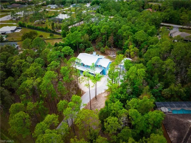 1.25 acres of serene views and wooded privacy
