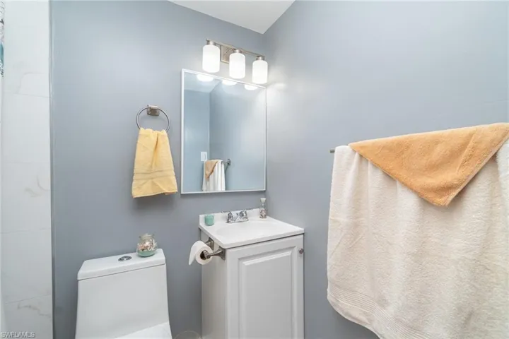 Bathroom with vanity and toilet