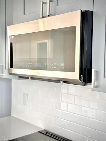 Room details featuring backsplash