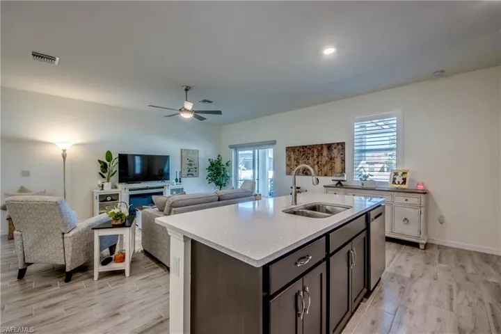 9'4" ceilings and plank tile flooring throughout the home. NO CARPET!