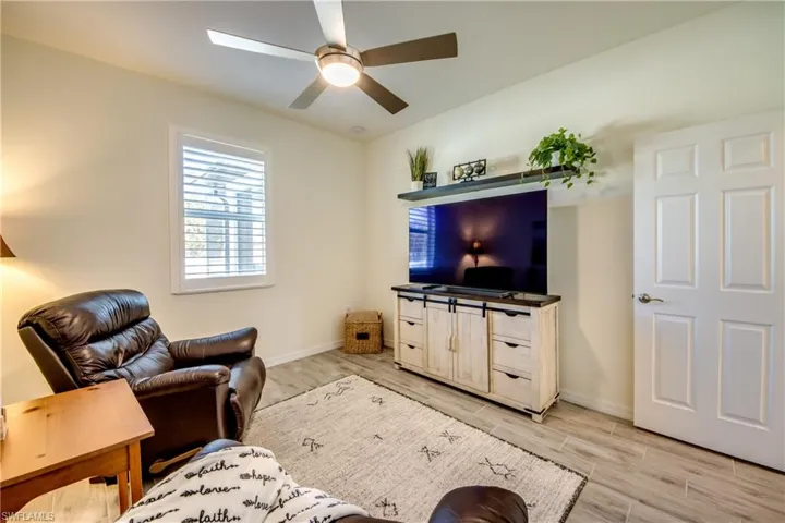 Bedroom 3 is furnished as a Family room. It measures appx 12'x12' and the window looks out to the backyard.