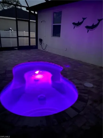 Night view of spa/pool. One of 5 colors to enjoy after dark.