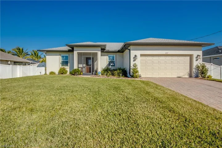 Almost new home with LOTS of UPGRADES is MOVE-IN READY! Make your appointment TODAY to view 2217 NE 33rd Ln, Cape Coral before it's too late!