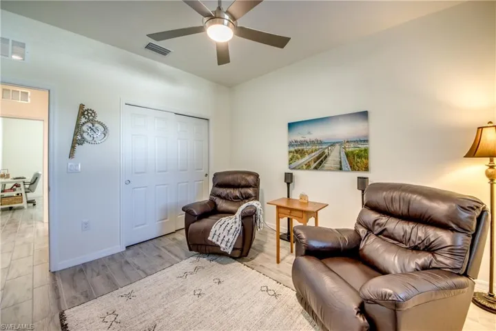 Bedroom 3 is furnished as a Family room. It measures appx 12'x12'.