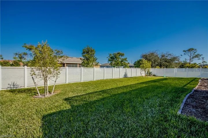 Plenty of room for play in the fenced backyard.