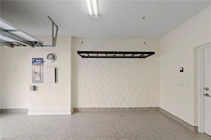 NEW DEDICATED GENERATOR OUTLET (2024), NEW HEAVY DUTY EPOXY FLOOR (2024), NEW HANGING STORAGE SHELVES (2021)