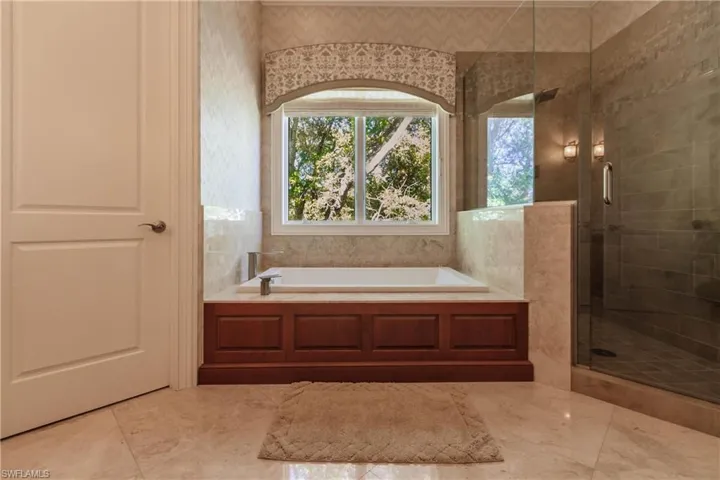 Bathroom with shower with separate bathtub