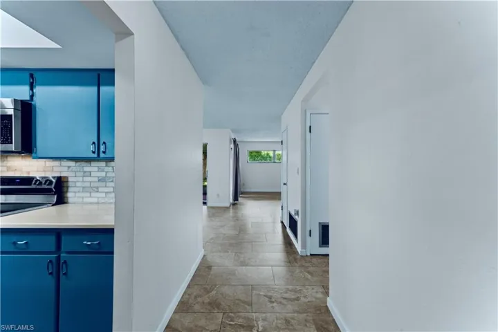 Hall featuring baseboards
