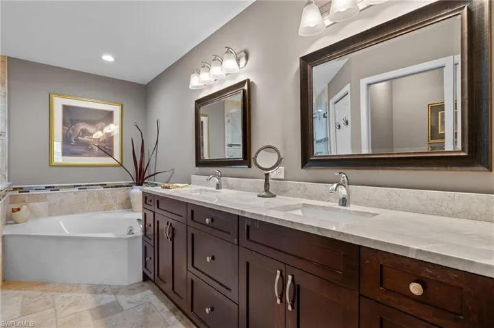 Bathroom with vanity and a bathtub