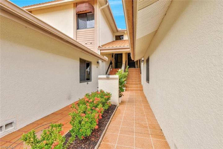 Front Walkway, to the left of Garage, Covered Entry