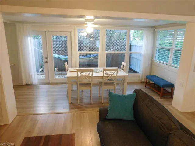 Dining room featuring plenty of natural light and hardwood / wood-style floors