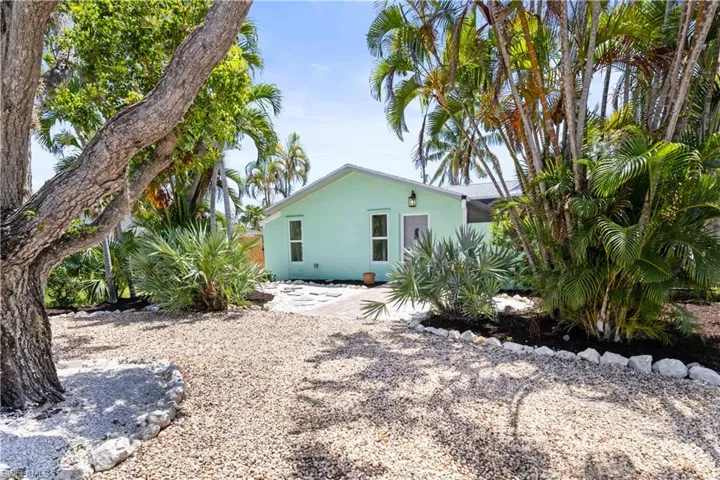 Nestled between the beautiful white sandy beaches and the Sanibel restaurants and shopping areas is this darling cottage that has been restored to perfection!