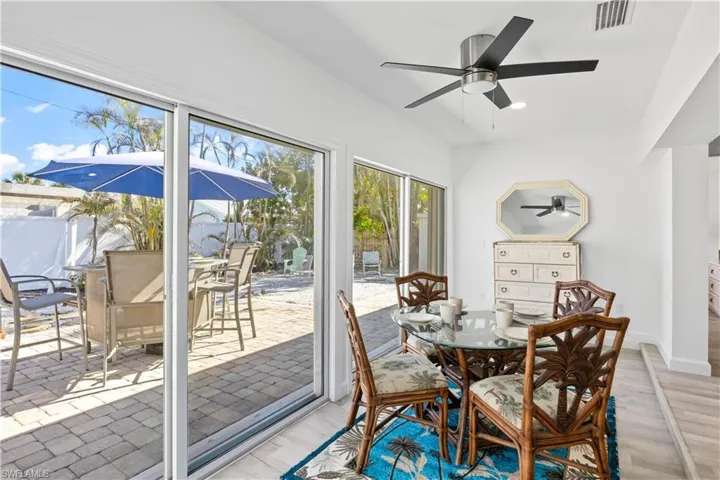 Looking out to the back yard with beautiful landscaping, fully fenced and a large storage shed!