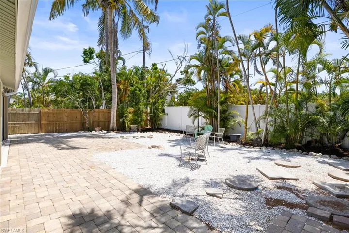 Very large backyard, fenced for privacy  your own little compound in the heart of the island!