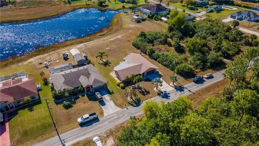 Aerial view of residential area with a nearby body of water