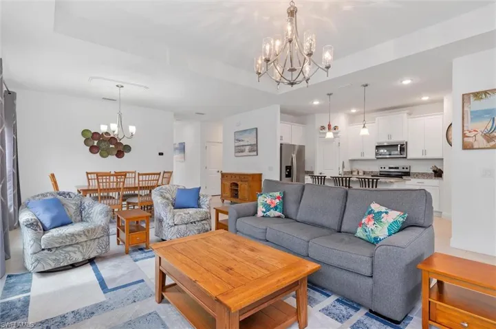 Living room featuring hanging lights