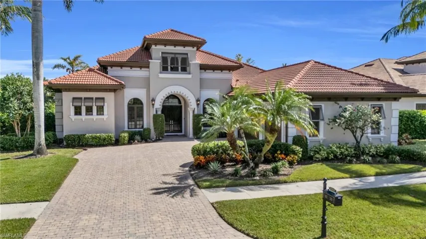 Mediterranean / spanish house featuring a front yard
