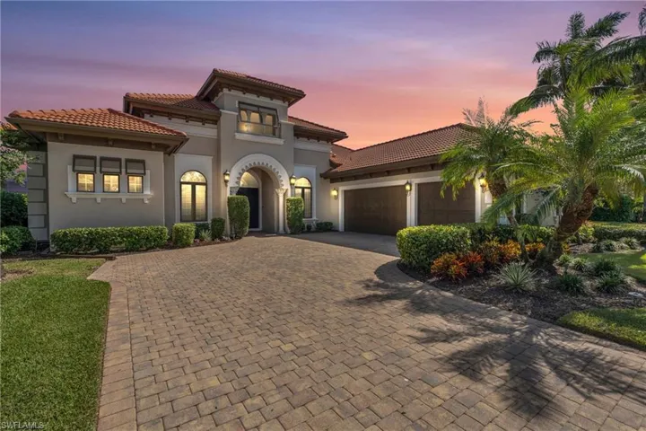 Mediterranean / spanish-style home featuring a garage