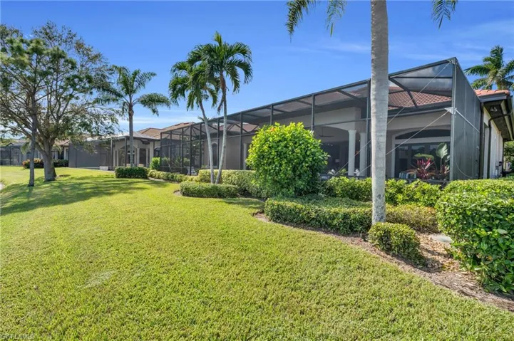 View of yard with a lanai