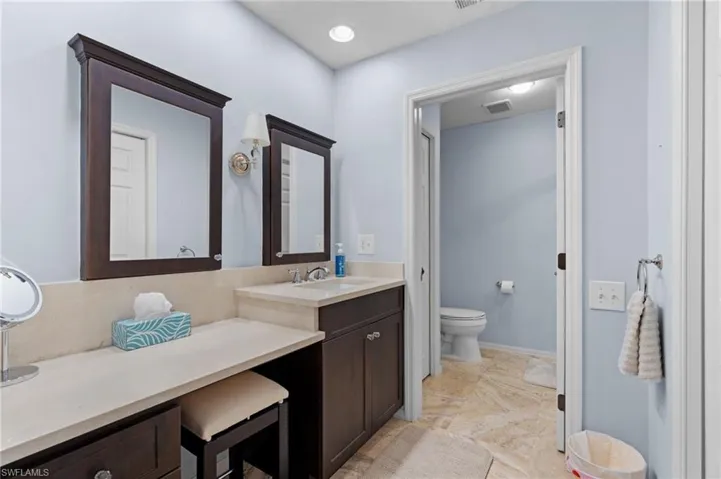 Bathroom with vanity and toilet