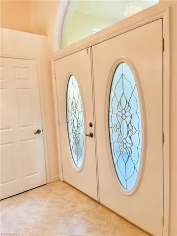 Double doors with coat closet