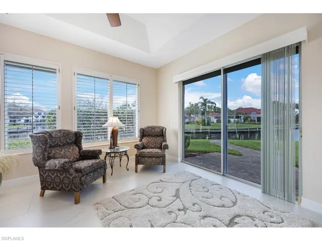 Sitting room featuring a water view, and walk way to the canal.