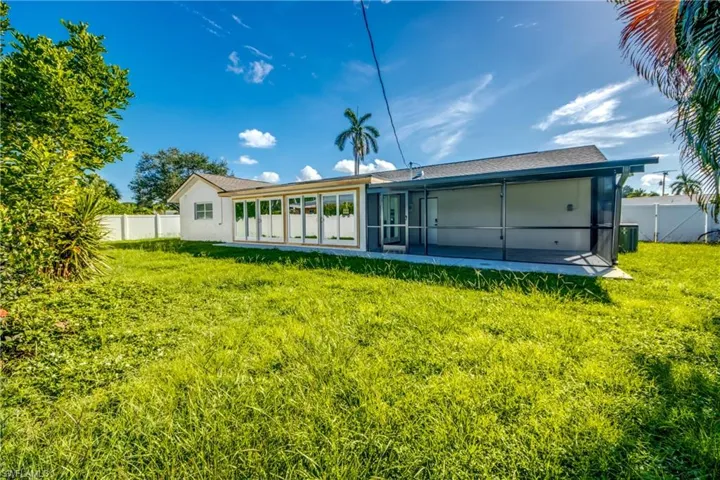 View of fenced backyard