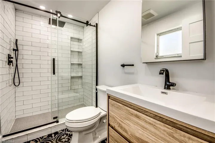 Laundry room with cabinet space and separate washer and dryer