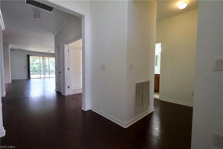 Unfurnished living room featuring ornamental molding, ceiling fan, light wood finished floors, and recessed lighting