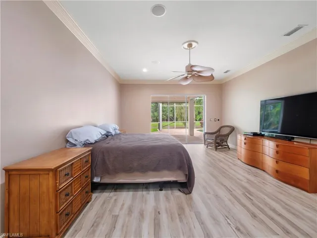 Spacious guest bedroom 1 offering comfort, flexibility, and abundant natural light, creating an inviting retreat for family, visitors, or a future home office.