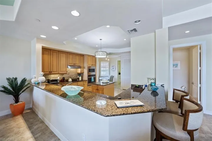580 Avellino Isles Cir 18102, Naples, Florida 34119
