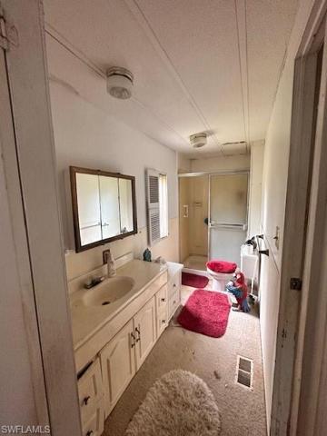 master bathroom with dual access