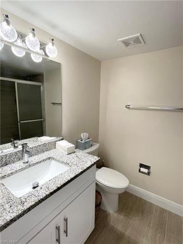 Guest bathroom with new sink fixtures and lighting