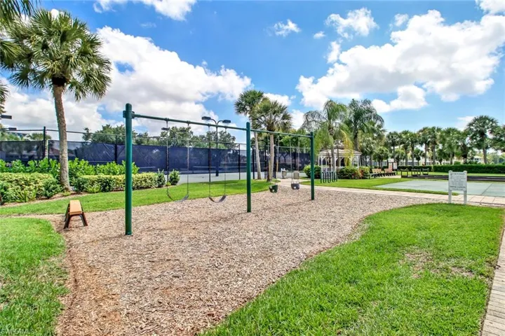 View of property's community featuring a yard