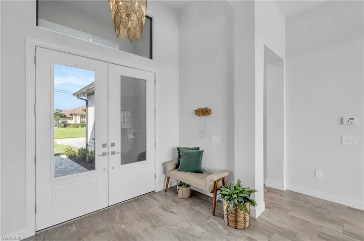 Entryway featuring french doors
