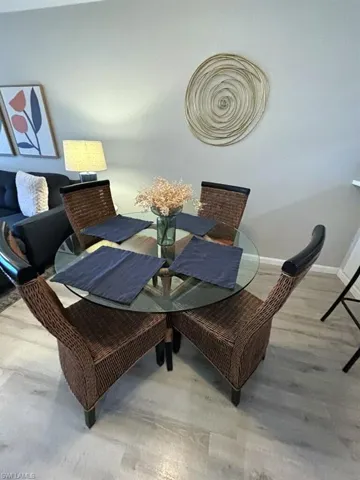 BETWEEN THE GREAT ROOM & KITCHEN
