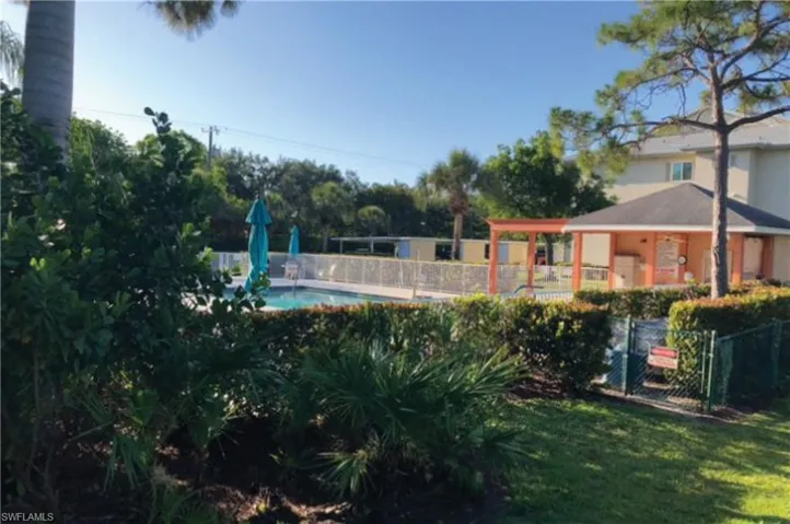 RIGHT FROM YOUR SUNROOM: COMMUNITY POOL
