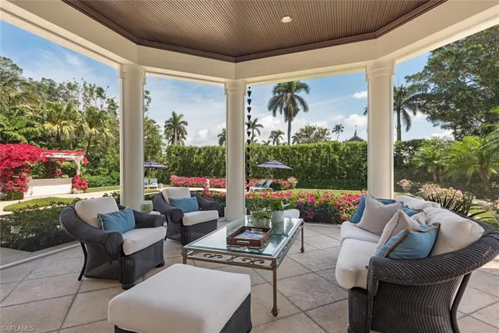 View of patio with an outdoor hangout area