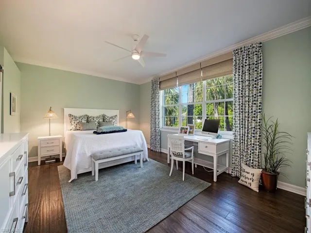 Spacious primary bedroom with beautiful views of creek and preserve