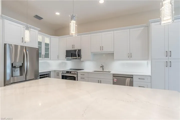 Pendant lighting above island