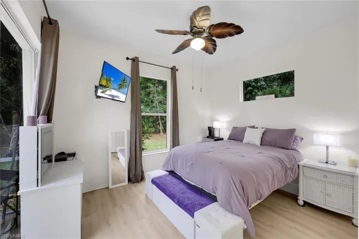 Bedroom featuring light wood-style floors and ceiling fan