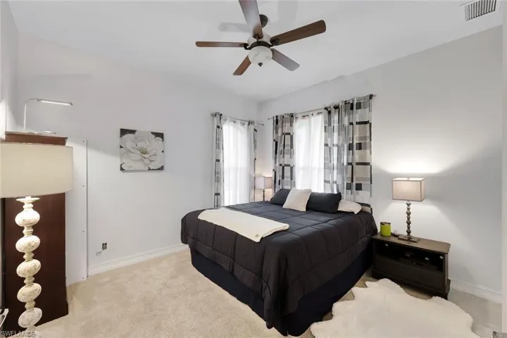 Bedroom with carpet floors and ceiling fan